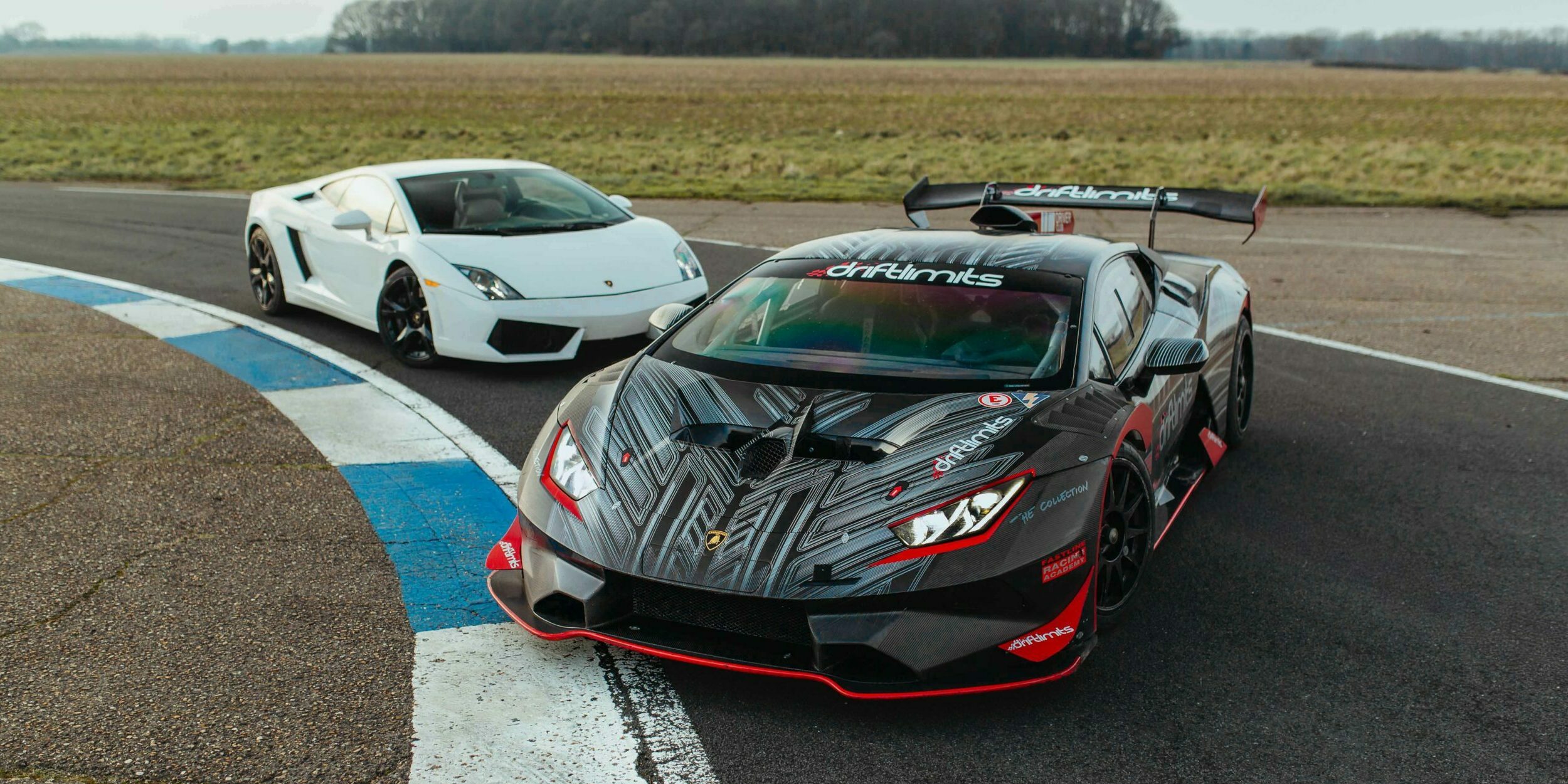 lamborghini's lined up next to each other for a driving experience